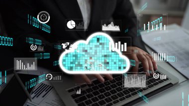 A blend of technology and data analysis showcases a user typing on a laptop with cloud graphics and digital data elements representing modern computing and analytics. Xenic