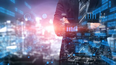 A businessman stands confidently in front of a vibrant cityscape, showcasing digital data and graphical analytics that represent growth and technology in finance. Xenic