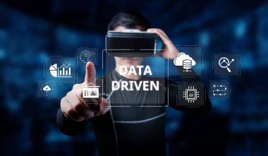 Explore a visually engaging image featuring a user interacting with virtual reality technology, emphasizing the importance of data-driven analytics for strategic decision making. XDMCP
