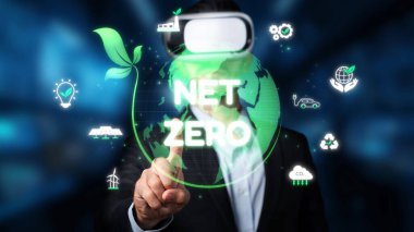 A business professional engages with a virtual reality interface displaying net zero emissions, highlighting sustainability and environmental icons for a greener future. Raster