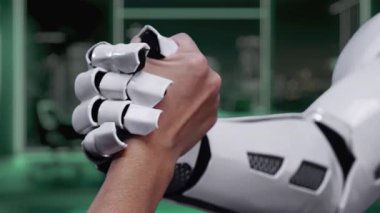 A futuristic hand reaching towards a globe surrounded by floating green icons symbolizes advancements in sustainability and renewable energy for a better world. Auvana