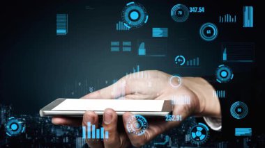 A hand presents a smartphone featuring an advanced digital interface with data visualizations, set against a modern urban backdrop, symbolizing technology and innovation. Xenic