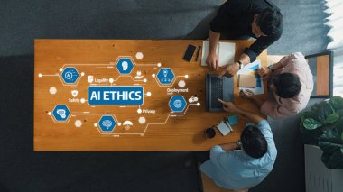 Aerial view of a team engaged in a discussion about AI ethics, featuring digital icons on a wooden table, emphasizing the importance of responsibility in technology development. Amity