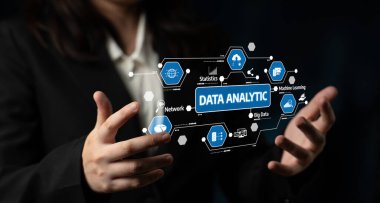 Business professional presenting data analytics concept with various icons representing statistics, machine learning, and big data in a creative visual format. Tessel