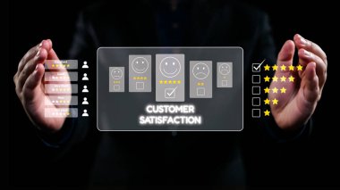 A professional setting showcasing hands gesturing towards digital metrics of customer satisfaction, featuring smiley faces and ratings to signify feedback. Qubit