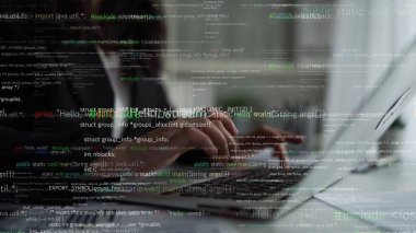 A close-up of a person focused on typing code on a laptop, surrounded by dynamic lines of programming syntax, representing modern technology and innovation in a workspace. Xenic