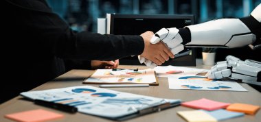 Bir insan ve robot ofis ortamında insan yaratıcılığı ve teknolojik yenilikler arasındaki işbirliğini simgeleyen profesyonel bir tokalaşmaya girişirler. Noogenesis