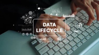 Conceptual image of hands typing on keyboard with digital graphics illustrating data lifecycle processes and information management. Asymptotic smart data analytic.