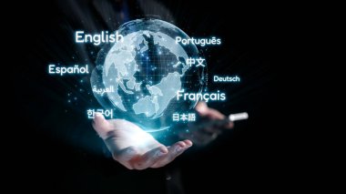 A captivating visual of a person holding a digital globe, showcasing various language names. This image symbolizes global communication and the richness of multilingualism. Qubit