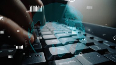 A close-up of a hand typing on a keyboard, enhanced by a digital globe and data visualizations, symbolizing technology and global communication in a modern workspace. Xenic