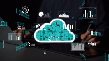 A visual representation of cloud computing with data graphs and analysis elements in a modern workspace, showcasing technology role in business evolution. Xenic