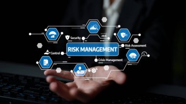 A professional hand extends towards a digital interface showcasing various icons related to risk management and assessment, emphasizing security and strategy in business. Tessel