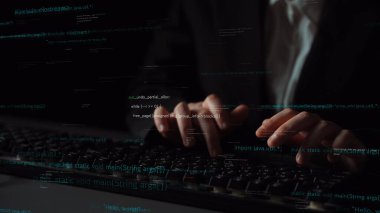 A professional programmer dressed in a suit is focused on coding at a computer keyboard in a dark setting, surrounded by digital code and technology elements. Xenic