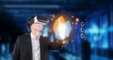 A business professional engages with virtual reality technology, visualizing data analytics and financial strategies in a modern office setting, showcasing innovation and growth. XDMCP