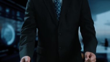 A businessman in a suit showcases graphical indicators representing quality and cost metrics in a modern office, emphasizing strategic analysis and business development. Qubit